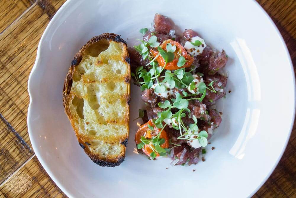 lamb tartar serverd with bread